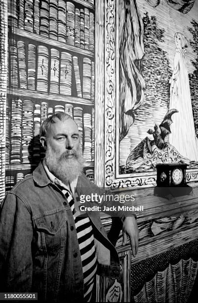 Portrait of American artist and author Edward Gorey on the set he designed for the Broadway revival of 'Dracula' at the Martin Beck Theatre, New...