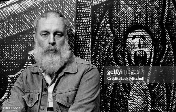 Portrait of American artist and author Edward Gorey on the set he designed for the Broadway revival of 'Dracula' at the Martin Beck Theatre, New...