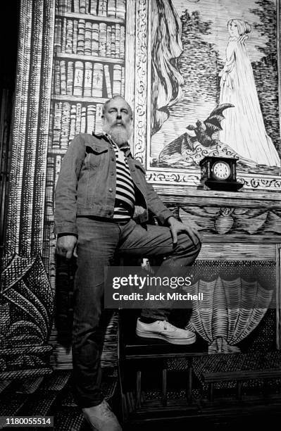 Portrait of American artist and author Edward Gorey on the set he designed for the Broadway revival of 'Dracula' at the Martin Beck Theatre, New...