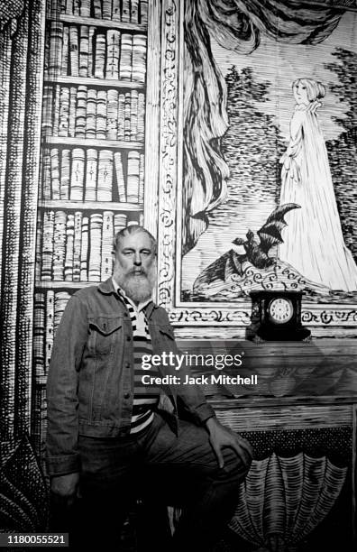 Portrait of American artist and author Edward Gorey on the set he designed for the Broadway revival of 'Dracula' at the Martin Beck Theatre, New...