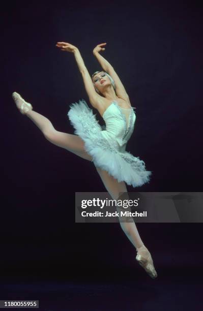 Russian-born American ballet dancer Valentina Kozlova, in costume for her role, dances in 'Swan Lake', June 1986.