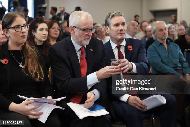 Labour leader, Jeremy Corbyn receives a glass of water from Keir Starmer, Shadow Secretary of State for Exiting the EU prior to delivering a Brexit...