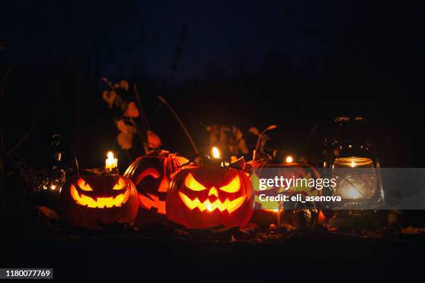 halloween jack-o-lantern pumpkins - halloween lantern stock pictures, royalty-free photos & images