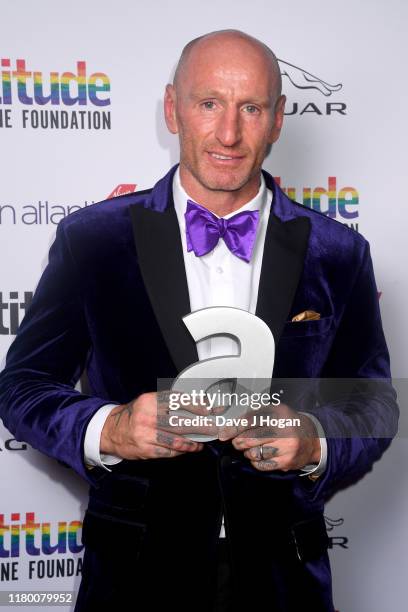 Gareth Thomas poses after winning the Game Changer award at the Attitude Awards 2019 at The Roundhouse on October 09, 2019 in London, England.