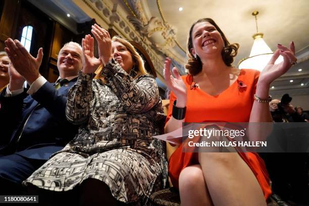 Britain's opposition Liberal Democrats party Leader, Jo Swinson applauds s speaker during an event to launch the Liberal Democrat 2019 General...