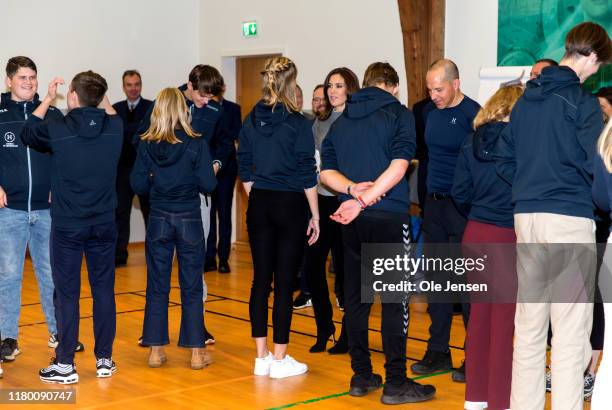 Crown Princess Mary of Denmark is doing an exercise about communication with students at Hoeng Continuation School on November 5, 2019 in Hong,...