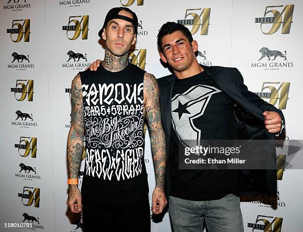 Drummer Travis Barker and mixed martial artist Dominick Cruz arrive at a post-fight party for UFC 132 at Studio 54 inside the MGM Grand Hotel/Casino...