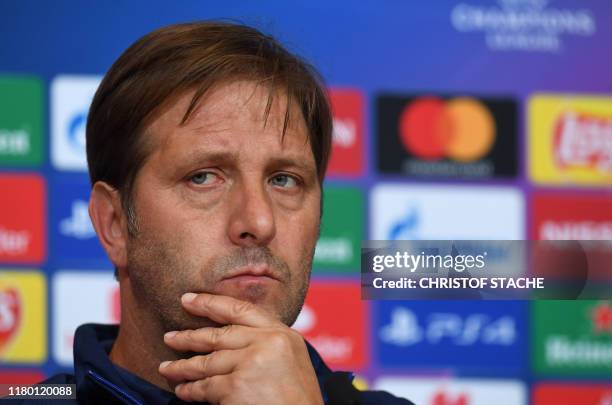 Olympiakos' Portuguese coach Pedro Martins attends a press conference on the eve of the UEFA Champions League Group B football match FC Bayern Munich...