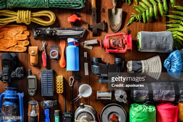 top view camping and hiking travel and hiking gear, equipment and accessories for mountain trips - equipment stock pictures, royalty-free photos & images