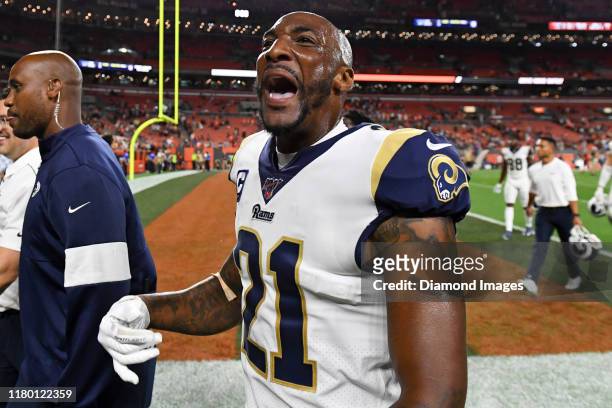 Cornerback Aqib Talib of the Los Angeles Rams yells toward the crowd as he walks off the field after a game against the Cleveland Browns on September...