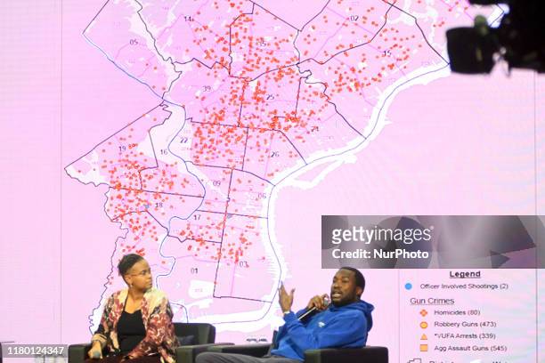 Map of gun crimes is show on the stage during the Players Coalition Town Hall on Policing in the city, at Community College of Philadelphia, PA, on...