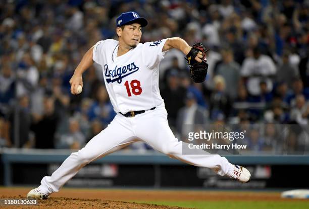 Kenta Maeda of the Los Angeles Dodgers pitches in the eighth inning of game five of the National League Division Series against the Washington...