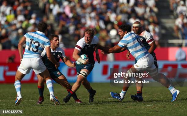 Player Ben Pinkelman makes a break during the Rugby World Cup 2019 Group C game between Argentina and USA at Kumagaya Rugby Stadium on October 09,...