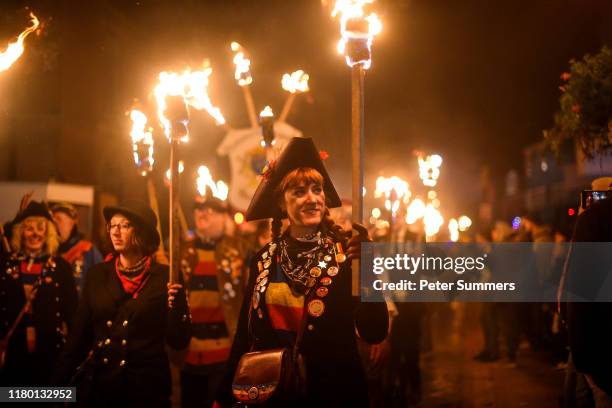 Bonfire societies parade through the streets during traditional Bonfire Night celebrations on November 5, 2019 in Lewes, England. The night's events...