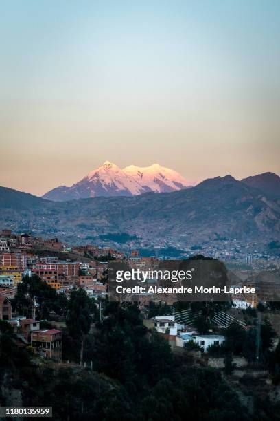 stunning illimani, the snow-capped mountain peak, landmark of la paz city - la paz bolivia stock pictures, royalty-free photos & images