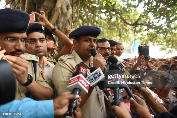 Senior Delhi police personnel speak to the media during a protest by the police against lawyers after their recent scuffle at Tis Hazari and Saket...