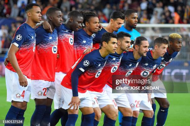 Lille's players Lille's Brazilian defender Gabriel Dos Santos, Lille's French midfielder Boubakary Soumare, Lille's French defender Adama Soumaoro,...