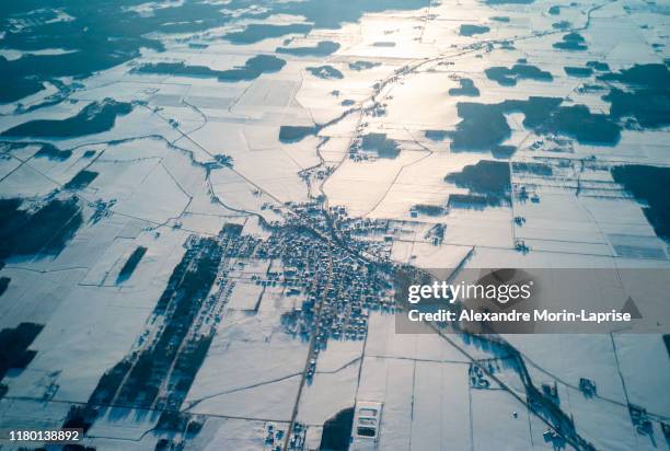 rural/countryside south québec during winter, farmlands, villages and roads - quebec aerial stock pictures, royalty-free photos & images