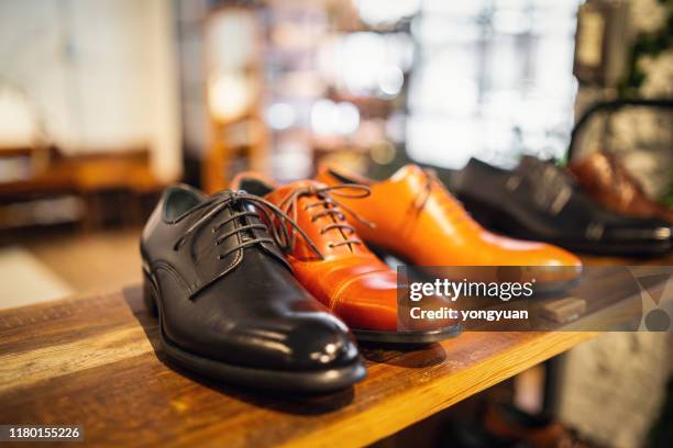 leather shoes in a store - leather shoe stock pictures, royalty-free photos & images