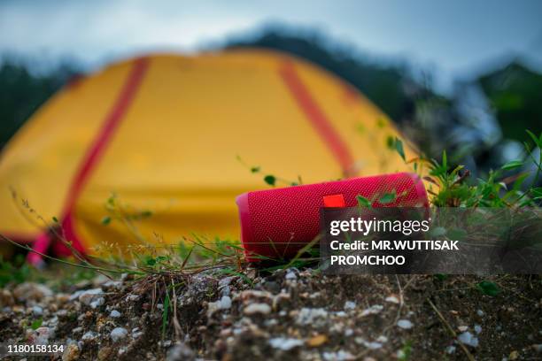 red portable speaker. - portability stock pictures, royalty-free photos & images