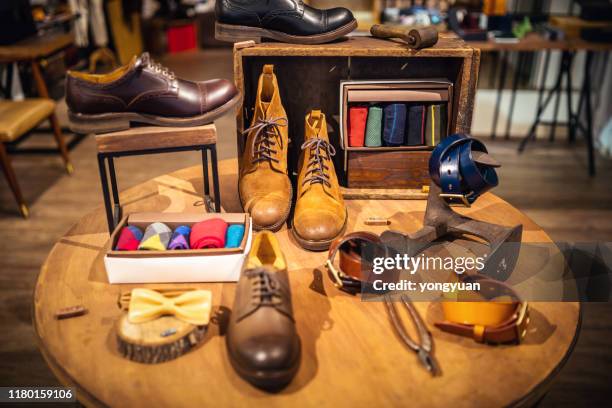 men's accessories in a shoe store - leather belt stock pictures, royalty-free photos & images