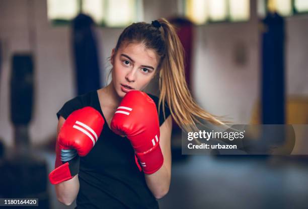 boxing in the gym - girl punch stock pictures, royalty-free photos & images