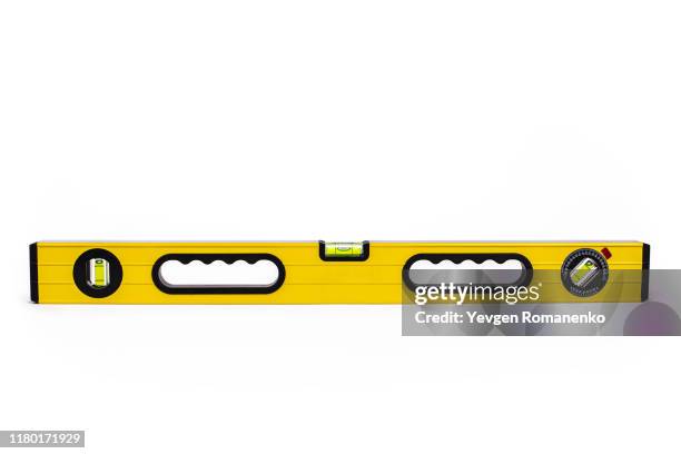 yellow level tool isolated on white - waterpas stockfoto's en -beelden