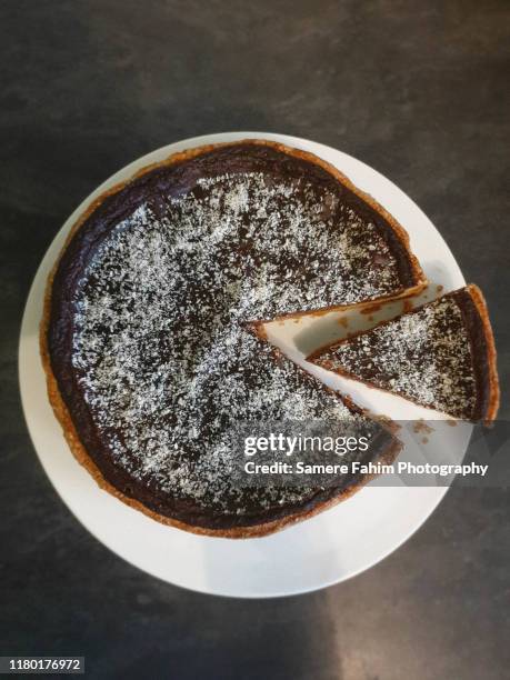 high angle view of chocolate and coconut tart - coco rallado fotografías e imágenes de stock