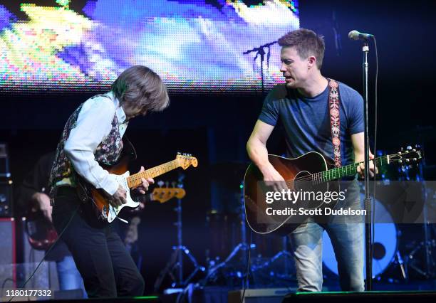Musicians Eric Johnson and Jonny Lang performs onstage during the Experience Hendrix concert at City National Grove of Anaheim on October 09, 2019 in...