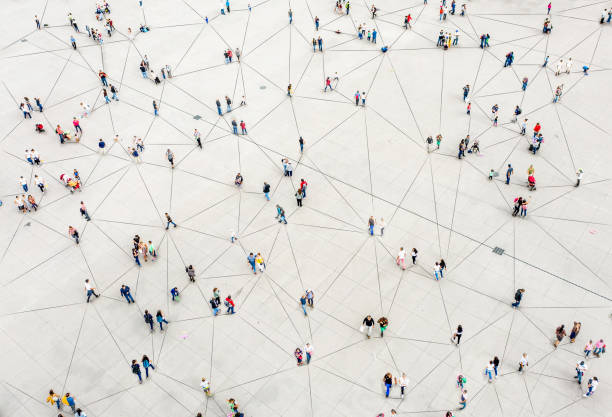 aerial view of crowd connected by lines - networking stock pictures, royalty-free photos & images