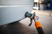 Refueling a car with LPG gas