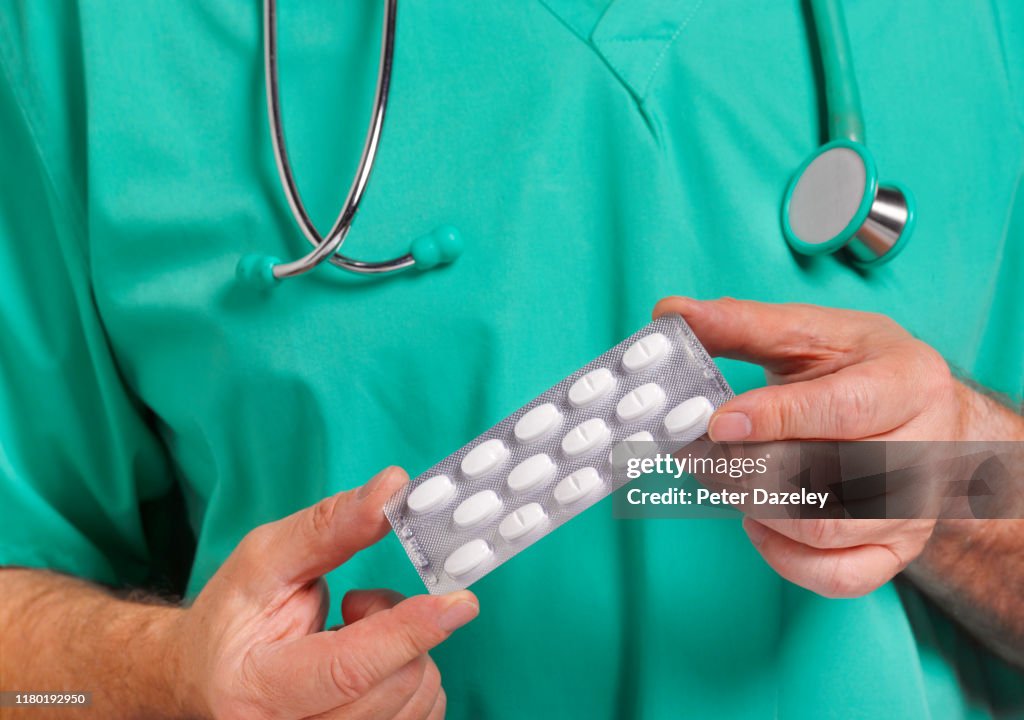 Doctor offering anti depressants to patient