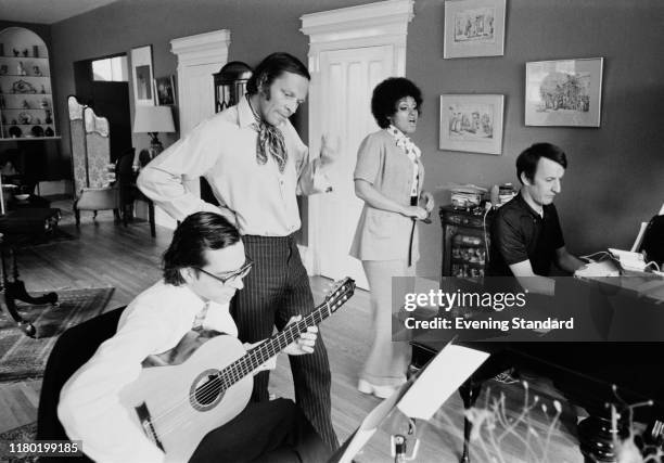 English jazz composer, saxophonist, clarinetist and writer John Dankworth , English singer and actress Cleo Laine, English composer of film, TV and...