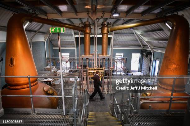 Peter Holroyd Kingsbarns distillery manager looks in the spirit safe on October 10, 2019 in St Andrews, Scotland. The United States is imposing a 25%...