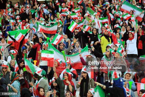 Female football fans show their support ahead of the FIFA World Cup Qualifier match between Iran and Cambodia at Azadi Stadium on October 10, 2019 in...