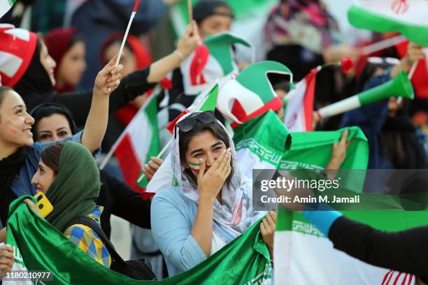 Female football fans show their support ahead of the FIFA World Cup Qualifier match between Iran and Cambodia at Azadi Stadium on October 10, 2019 in...