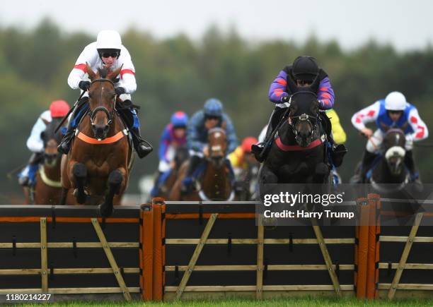 Back on the Lash ridden by Patrick Cowley jump the last on their way to winning the Join Racing TV Now Conditional Jockeys’ Handicap Hurdle at Exeter...