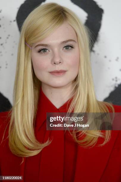 Elle Fanning attends a photocall for "Maleficent: Mistress of Evil" at Mandarin Oriental Hotel on October 10, 2019 in London, England.