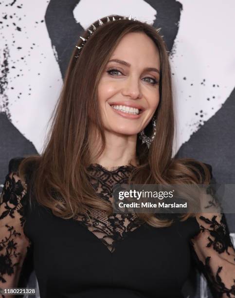 Angelina Jolie attends a photocall for "Maleficent: Mistress of Evil" at Mandarin Oriental Hotel on October 10, 2019 in London, England.