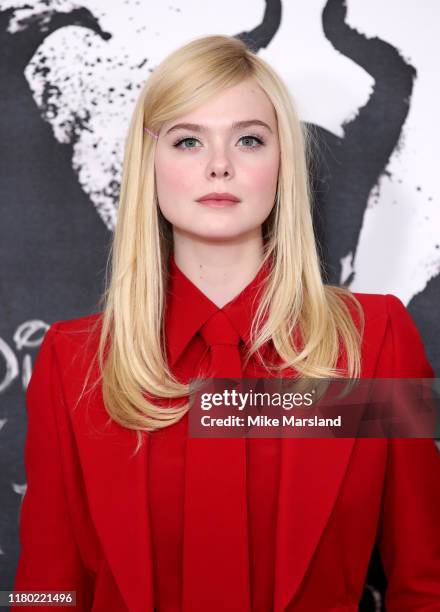 Elle Fanning attends a photocall for "Maleficent: Mistress of Evil" at Mandarin Oriental Hotel on October 10, 2019 in London, England.