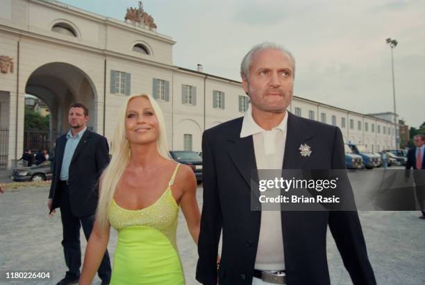 Italian fashion designers Gianni Versace and Donatella Versace attend the Pavarotti and Friends for War Child benefit concert at Parco Novi Sad in...