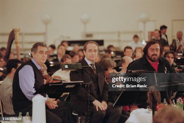 From left, opera singers Placido Domingo, Jose Carreras and Luciano Pavarotti of the operatic singing group The Three Tenors in rehearsal with an...