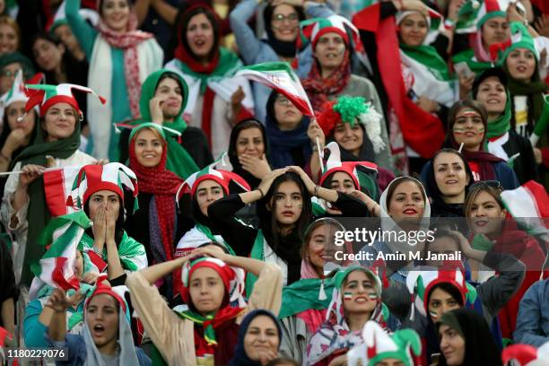 Iranian Women's fans react during the FIFA World Cup Qualifier match between Iran and Cambodia at Azadi Stadium on October 10, 2019 in Tehran, Iran.