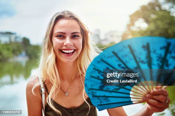 no i'm not a fan girl - fan women stock pictures, royalty-free photos & images