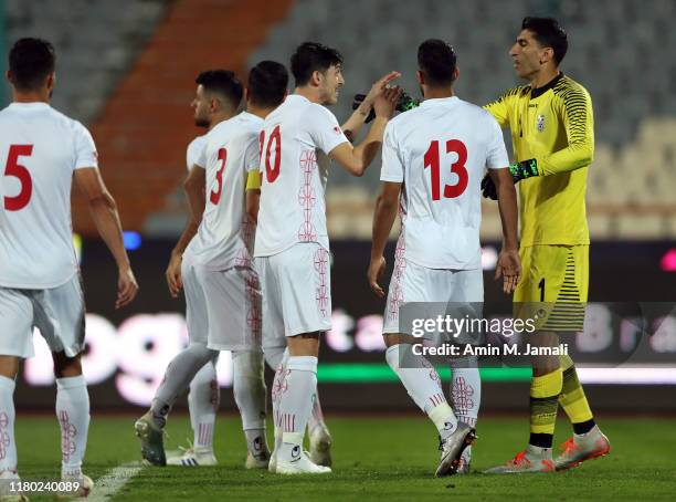 Iranian players react after the seventh goal during the FIFA World Cup Qualifier match between Iran v Cambodia at Azadi Stadium on October 10, 2019...