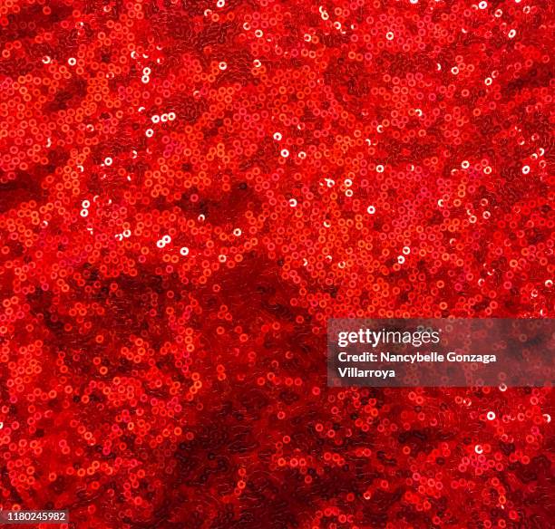 vibrant and bright red sequined material for clothes - paillettes or fond blanc bildbanksfoton och bilder