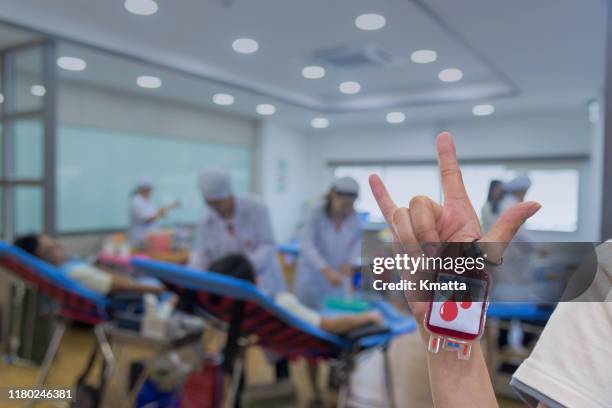 blood donation. - red cross stock pictures, royalty-free photos & images