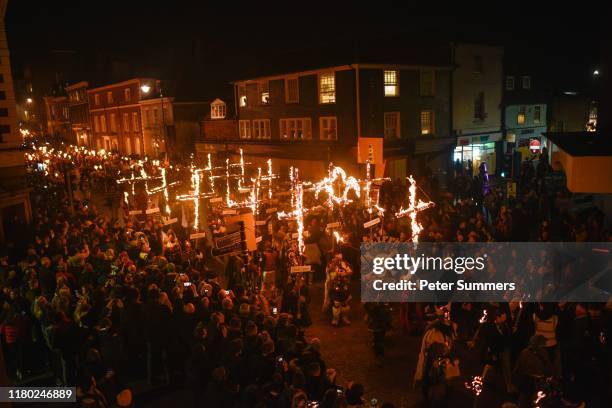 Bonfire societies parade through the streets during traditional Bonfire Night celebrations on November 5, 2019 in Lewes, England. The night's events...