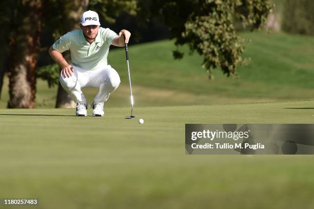 Tyrrel Hatton of England lines up a putt on the 14rd green during Day One of the Italian Open at Olgiata Golf Club on October 10, 2019 in Rome, Italy.