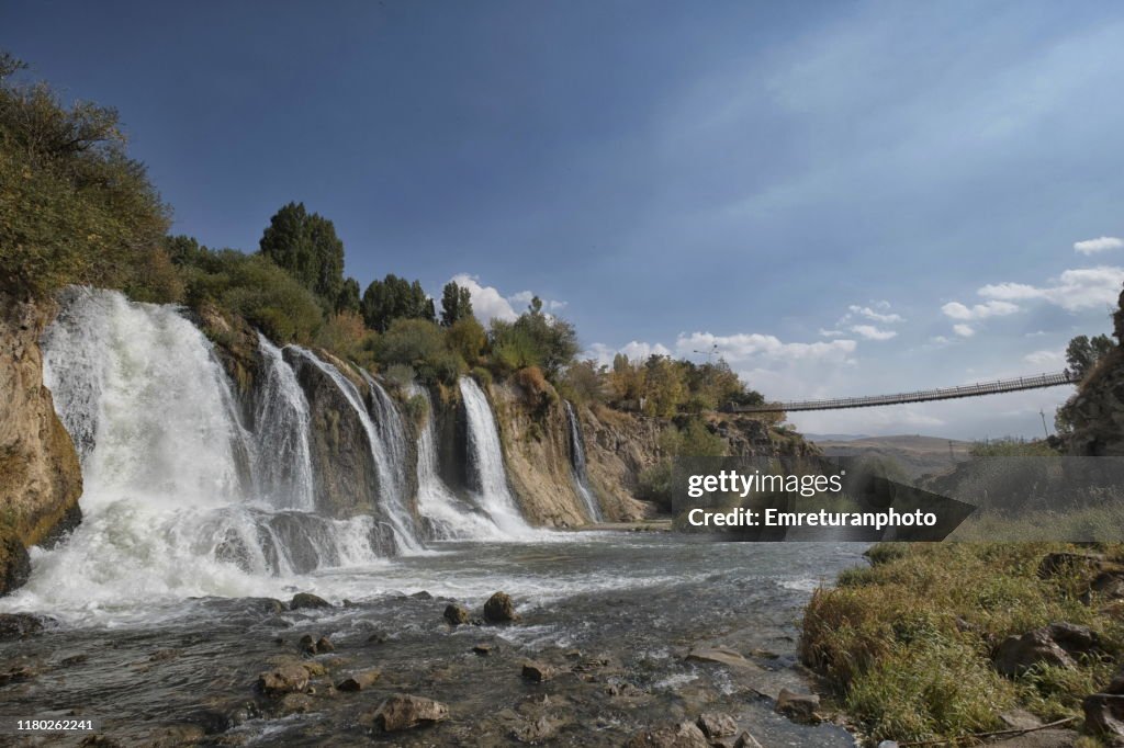Muradiye waterfalls and footbridge across the river,Eastern Turkey.